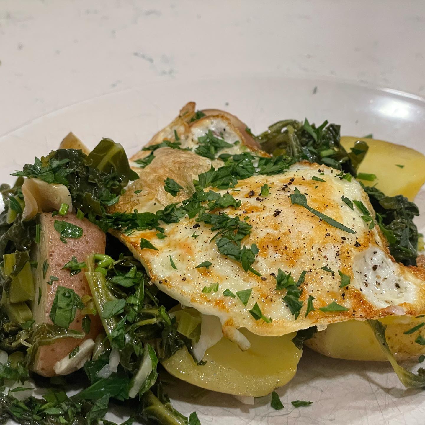 Full size image for Garlicky braised potatoes and greens. 