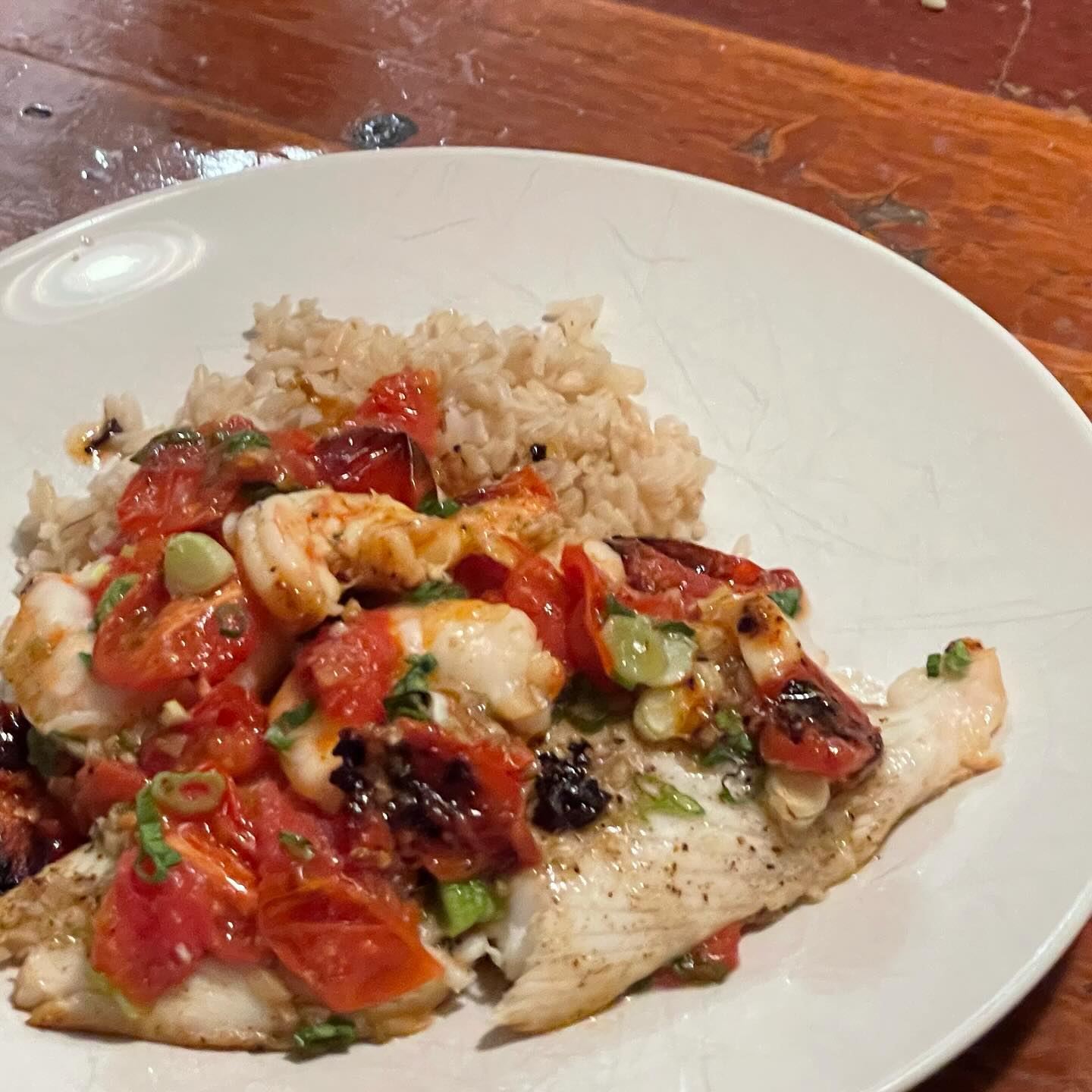 Full size image for Roasted fish with spice butter and tomatoes.