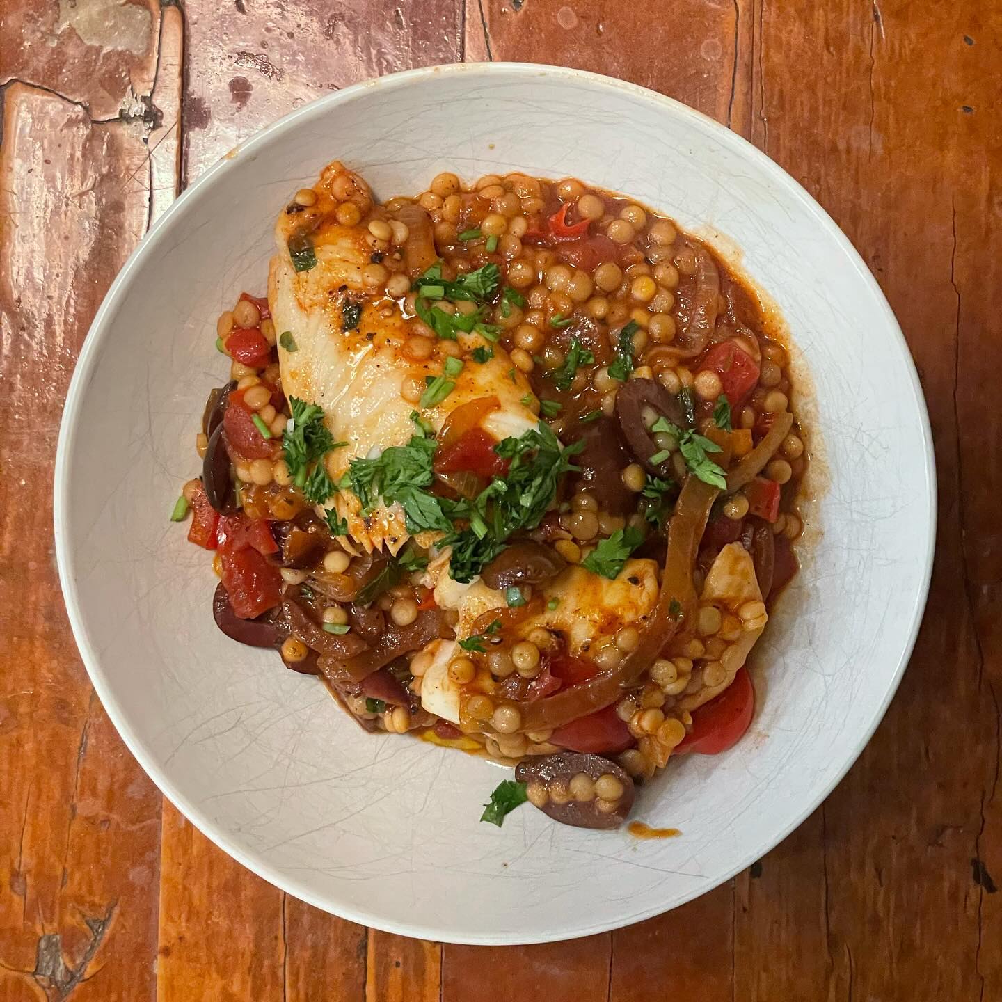Full size image for One pot smokey fish with tomato olive and pearl couscous. 